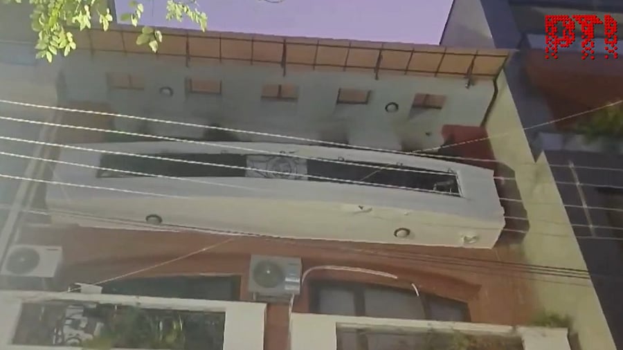 <div class="paragraphs"><p>Screengrab from a video showing the Safdarjung Enclave building which caught fire on Wednesday, killing an elderly couple.</p></div>