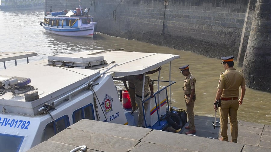 <div class="paragraphs"><p> Police personnel keep vigil at the coast following an incident where a ferry capsized off the Mumbai coast when a Navy craft crashed into it on Wednesday, in Mumbai, Thursday, Dec. 19, 2024.</p></div>