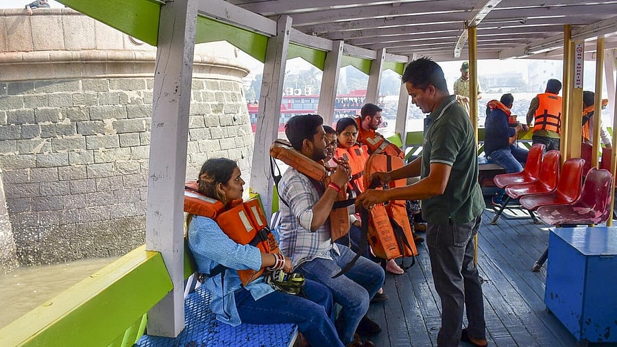 <div class="paragraphs"><p>Life jackets being distributed onboard, day after ferry accident</p></div>