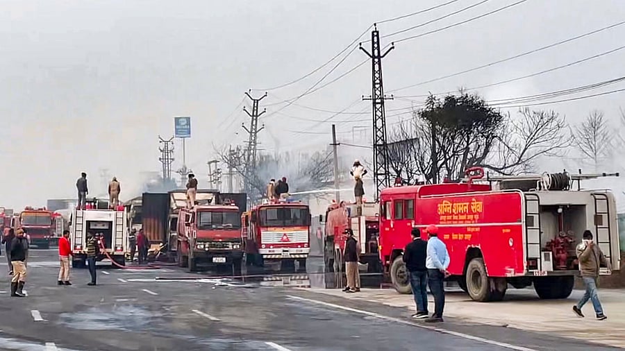 <div class="paragraphs"><p> Firefighters at the site of the accident after a truck loaded with a chemical collided with some other vehicles and caught fire on the Jaipur-Ajmer Highway.</p></div>