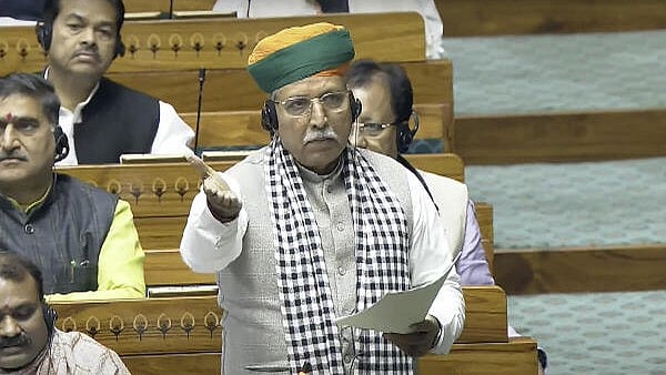 <div class="paragraphs"><p>Minister of State Arjun Ram Meghwal speaks in the Lok Sabha during the Winter session of Parliament, in New Delhi.&nbsp;</p></div>