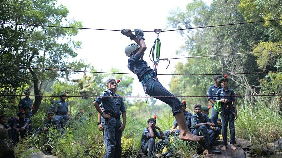 <div class="paragraphs"><p>Suhan Sudhakar from Bowline Adventure camp seen teaching fundamentals of rappelling to Rangers from Kavoor Government First Grade college (GFGC) at a two-day camp organised in Moolarahalli near Mudigere here recently.</p></div>