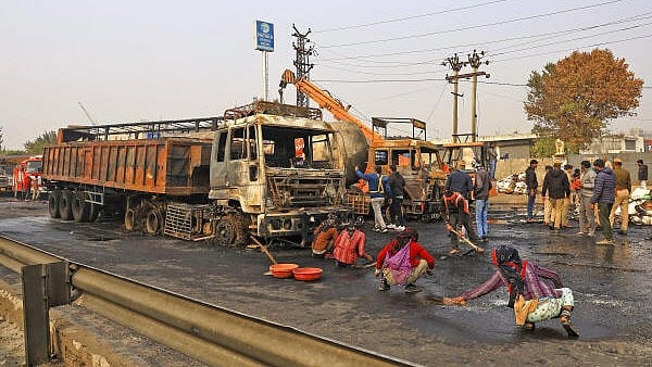 <div class="paragraphs"><p>Rescue operation after an LPG tanker collided with multiple vehicles on the Jaipur-Ajmer Highway, in Jaipur, on Friday.</p></div>