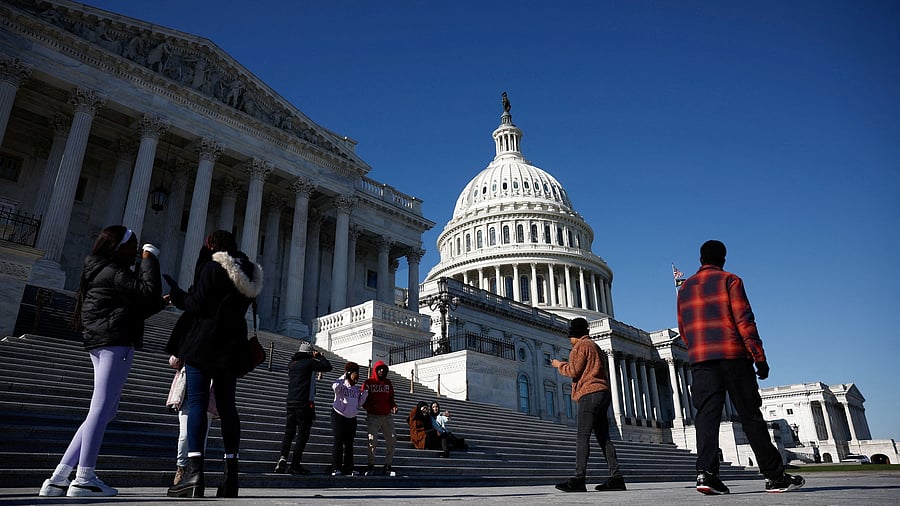 <div class="paragraphs"><p>People walk near the US Capitol in Washington, DC, US.</p></div>