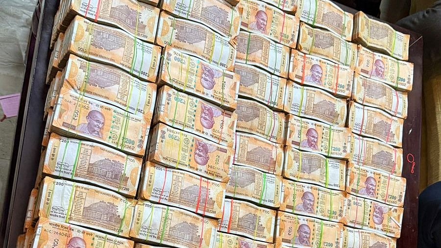 <div class="paragraphs"><p>Note bundles recovered in raid.</p></div>