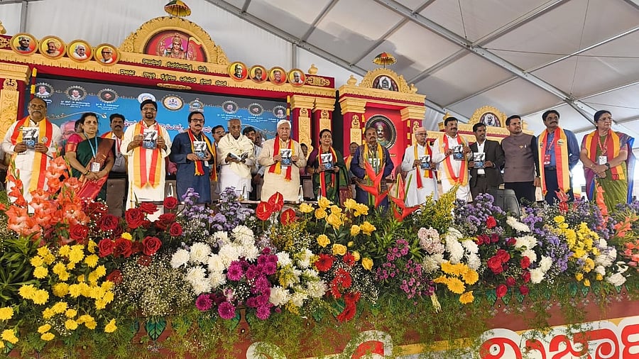<div class="paragraphs"><p>Law Minister H K Patil and former Chairman of Legislative Council B L Shankar release a book to mark the centenary celebrations of the Belagavi Congress session, chaired by M K Gandhi, during the 87th Akhila Bharatha Kannada Sahitya Sammelana, in Mandya, on Saturday. Sammelana president Go Ru Channabasappa, Kannada Sahitya Parishat president Mahesh Joshi and MLA P M Narendraswamy are seen. </p></div>