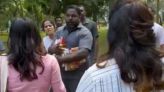 <div class="paragraphs"><p>A screengrab from the clip of the incident where field officers from the Horticulture department are seen taking away books from people in Cubbon Park on Saturday. </p></div>