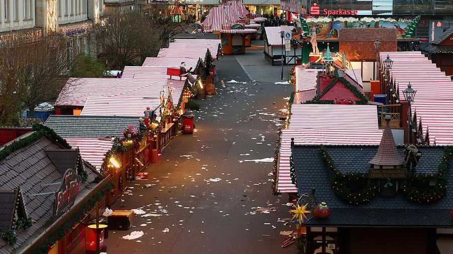 <div class="paragraphs"><p>Closed stalls stand at the site where a car drove into a crowd at a Magdeburg Christmas market in Magdeburg, Germany.</p></div>
