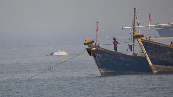 <div class="paragraphs"><p> Portion of a ferry, which was recently capsised off Mumbai coast when a Navy craft crashed into it, is seen afloat at Bhaucha Dhakka, in Mumbai</p></div>