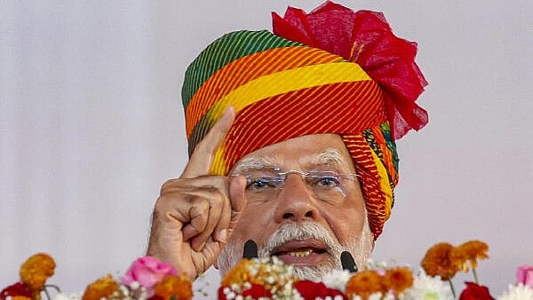 <div class="paragraphs"><p>Prime Minister Narendra Modi addresses a gathering during the 'Ek Varsh-Parinaam Utkarsh' event, marking the completion of one year of Rajasthan government, in Jaipur, Tuesday, Dec. 17, 2024. PM Modi will inaugurate and lay the foundation stone for several projects in Jaipur.</p></div>