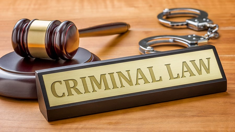 <div class="paragraphs"><p>Image showing a gavel, handcuffs, and a plaque bearing the words 'criminal law'. For representational purposes.</p></div>