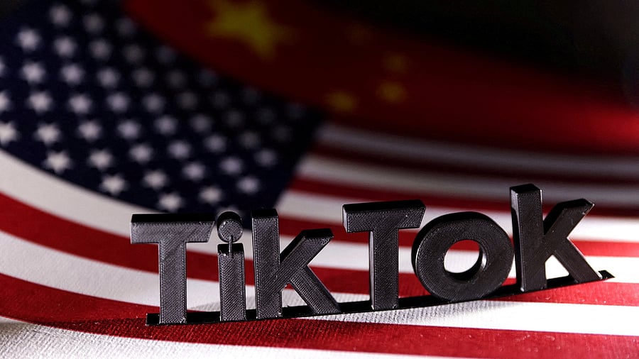<div class="paragraphs"><p>TikTok logo is placed on the US  flag.</p></div>
