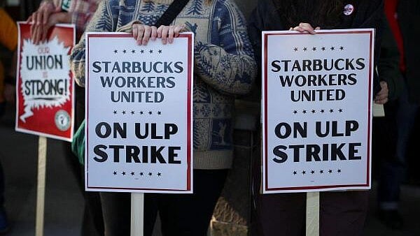 <div class="paragraphs"><p>Baristas picket in front of a Starbucks in Burbank, California, US.</p></div>