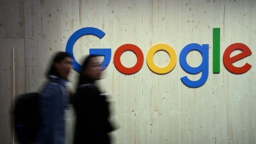 <div class="paragraphs"><p>People walk next to a Google logo. For representational purposes.</p></div>