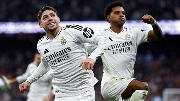 <div class="paragraphs"><p>Real Madrid's Federico Valverde celebrates scoring their second goal with Rodrygo.</p></div>