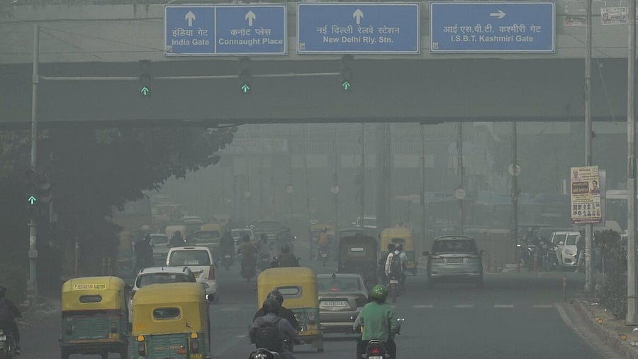 <div class="paragraphs"><p>Vehicles move amid smog.</p></div>