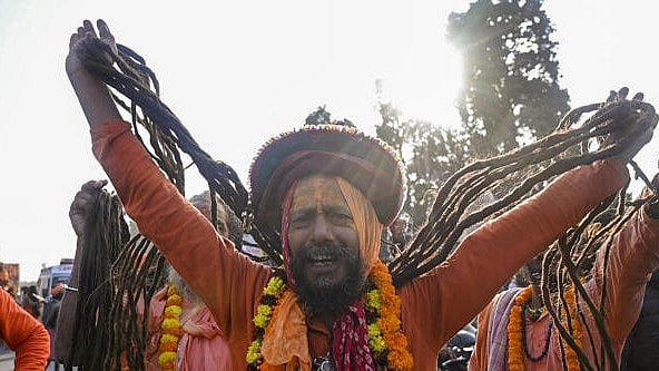 <div class="paragraphs"><p>A ‘sadhu’ at ‘peshwai’, a religious procession, ‘Panch Dashnam Avahan Akhara’ during ‘chavni pravesh’, the entry of akharas in the ‘Maha Kumbh Mela’ festival, in Prayagraj.&nbsp;</p></div>