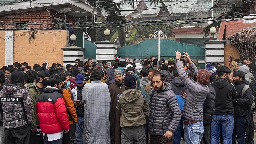 <div class="paragraphs"><p>Medical students stage a protest, led by Aga Syed Ruhullah Mehdi (unseen), demanding rationalisation of reservation in Jammu and Kashmir, outside J&amp;K Chief Minister Omar Abdullah’s residence in Srinagar.</p></div>