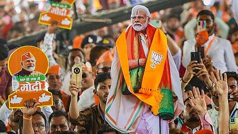 <div class="paragraphs"><p>BJP supporters during a public meeting of Prime Minister Narendra Modi for Lok Sabha elections, in Dhar, Madhya Pradesh. </p></div>