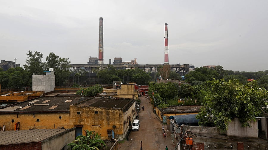 <div class="paragraphs"><p>Chimneys of a coal-fired power plant are pictured in New Delhi. </p></div>