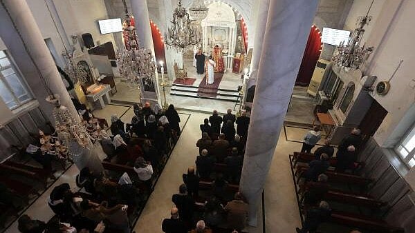 <div class="paragraphs"><p>Christians attend the morning Sunday mass at St.George's Syriac Orthodox Church - Syriac Orthodox Patriarchate of Antioch at the Old City of Damascus, after fighters of the ruling Syrian body ousted Syria's Bashar al-Assad, in Damascus, Syria, December 22, 2024.</p></div>