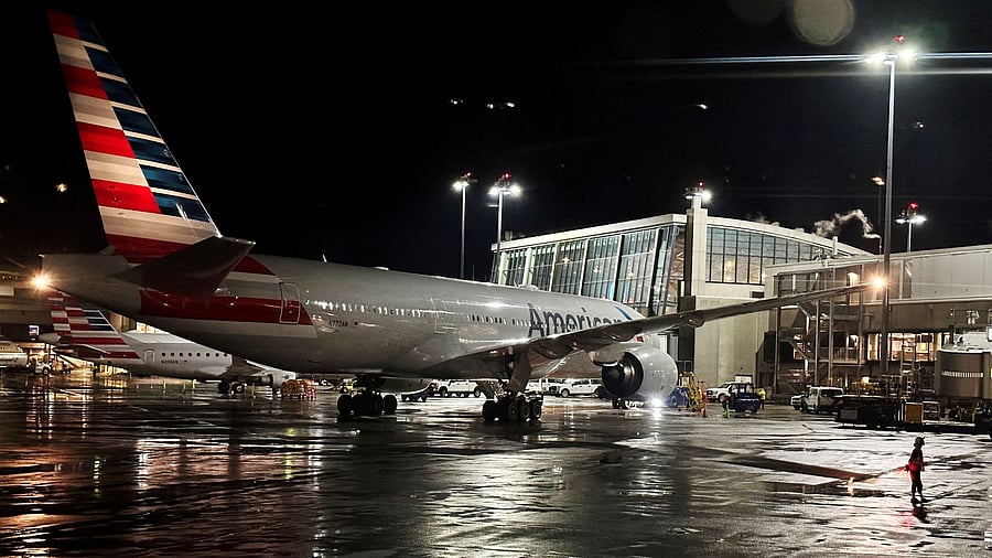 <div class="paragraphs"><p>An American Airlines plane sits at a gate at Logan Airport ahead of the July 4th holiday in Boston.&nbsp;</p></div>