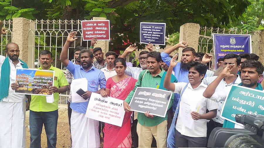 <div class="paragraphs"><p>Activists protest over the issue</p></div>