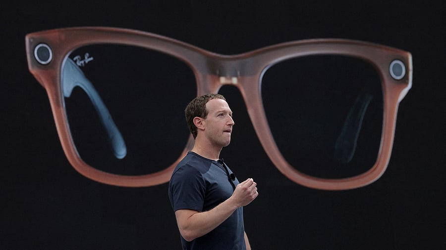 <div class="paragraphs"><p>FILE PHOTO: Meta CEO Mark Zuckerberg delivers a speech, as a pair of Ray-Ban smart glasses appear on screen, during the Meta Connect event at the company's headquarters in Menlo Park, California, US.</p></div>
