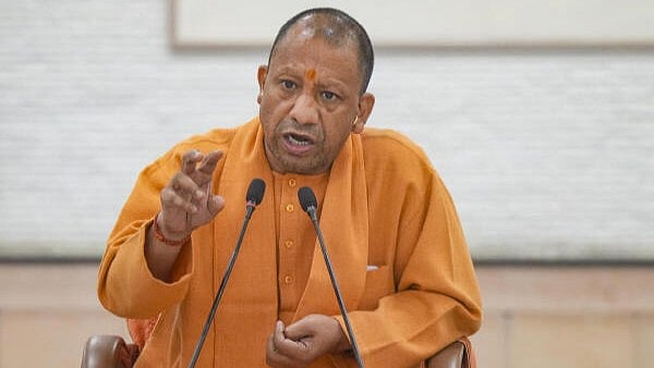 <div class="paragraphs"><p>Uttar Pradesh Chief Minister Yogi Adityanath addresses a press conference, at his residence in Lucknow, Tuesday, Dec. 24, 2024.</p></div>