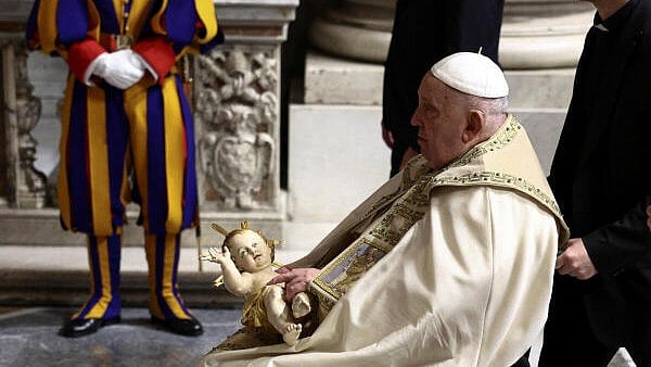 <div class="paragraphs"><p>Pope Francis holds a figurine of baby Jesus during the Christmas Eve Mass in St. Peter's Basilica at the Vatican, December 24, 2024.</p></div>