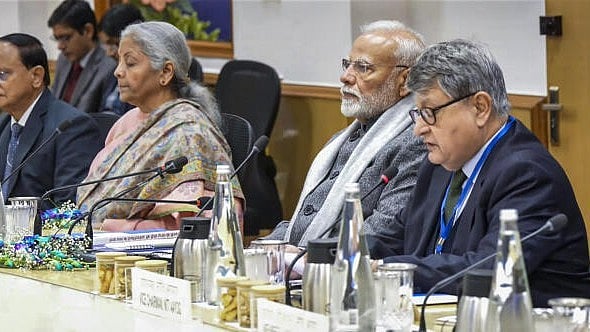 <div class="paragraphs"><p>Prime Minister Narendra Modi chairs a NITI Aayog meeting with economists, Tuesday, Dec. 24, 2024. Union Finance Minister Nirmala Sitharaman is also seen. </p></div>