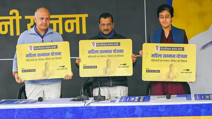 <div class="paragraphs"><p>Delhi Chief Minister Atishi with AAP National Convener Arvind Kejriwal and party leader Manish Sisodia during a press conference regarding the launch of registrations for the party's 'Mahila Samman Yojana' and 'Sanjeevani Yojana', in New Delhi, Sunday, December 22, 2024.</p></div>
