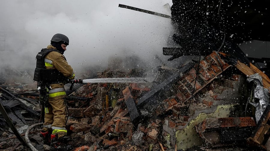 <div class="paragraphs"><p>A firefighter works at the site of residential buildings in Kharkiv hit by a Russian drone strike.</p></div>