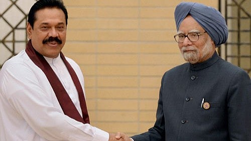 <div class="paragraphs"><p>Former Prime Minister Manmohan Singh with then Sri Lankan president Mahinda Rajapaksa. </p></div>