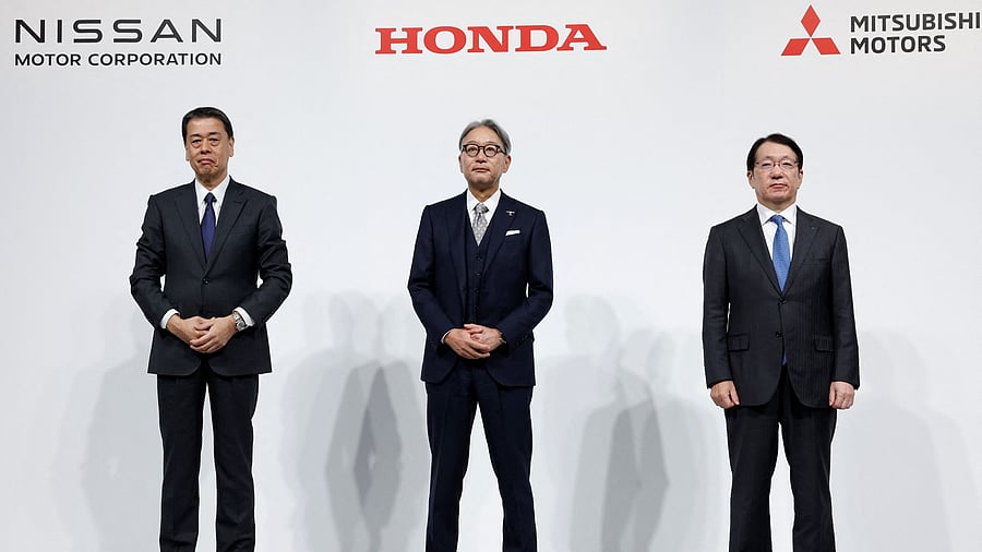 <div class="paragraphs"><p>Makoto Uchida Director Representative Executive Officer President and CEO of Nissan Motor Corporation Toshihiro Mibe Director President and Representative Executive Officer of Honda and Takao Kato Director Representative Executive Officer President &amp; CEO of Mitsubishi Motors pose for a photo following a joint press conference on their merger talks in Tokyo Japan December 23 2024. </p></div>