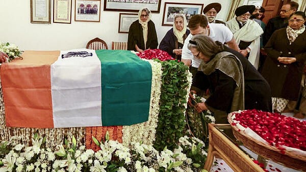 <div class="paragraphs"><p>Congress Parliamentary Party chairperson Sonia Gandhi pays her last respects to former prime minister Manmohan Singh at the latter's residence, in New Delhi, Friday, Dec. 27, 2024. LoP in the Lok Sabha Rahul Gandhi is also seen. </p></div>