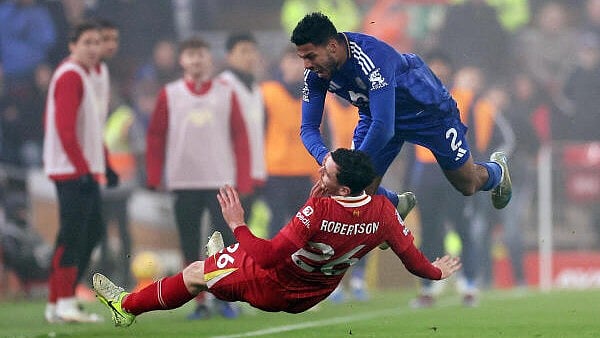<div class="paragraphs"><p>Leicester City's James Justin in action with Liverpool's Andrew Robertson</p></div>