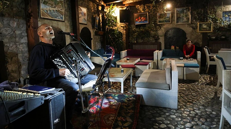 <div class="paragraphs"><p>Bosnian musician Enes Salman plays the accordion while performing the traditional love song Sevdalinka, in Sarajevo, Bosnia and Herzegovina, December 20, 2024.</p></div>