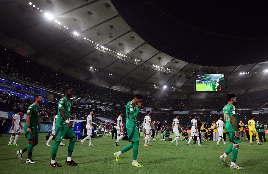<div class="paragraphs"><p> General view as the Iraqi teams walks out before the start of the match </p></div>