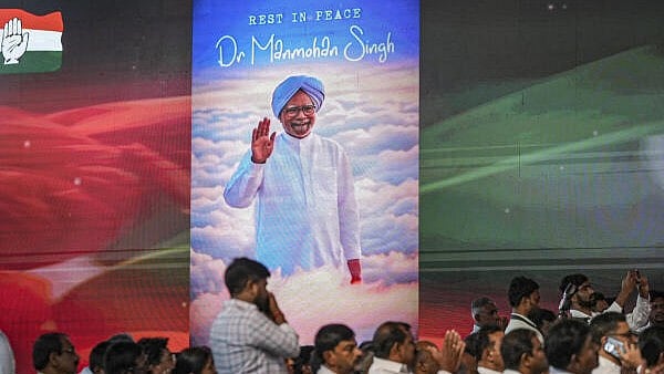 <div class="paragraphs"><p>Congress workers during a condolence meeting for former prime minister Manmohan Singh, who passed away on Thursday, in Belagavi, Karnataka</p></div>