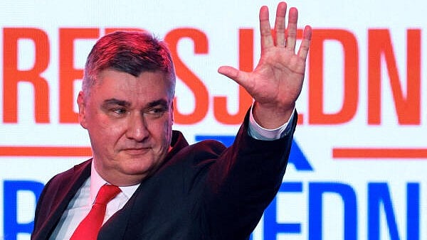 <div class="paragraphs"><p>Croatian President and presidential candidate Zoran Milanovic waves to supporters</p></div>