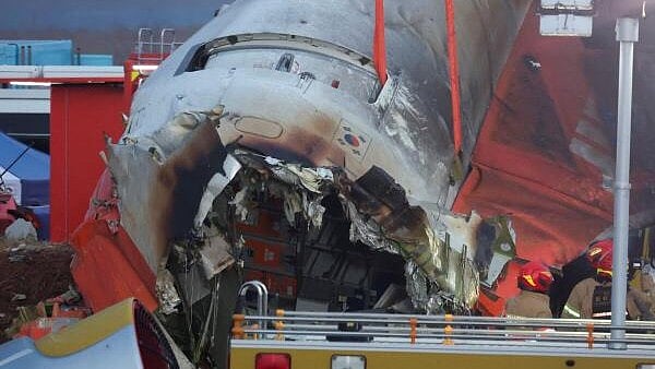 <div class="paragraphs"><p>Efforts are made to lift the wreckage of an aircraft lying on the ground after it went off the runway and crashed at Muan International Airport, in Muan, South Korea.&nbsp;</p></div>