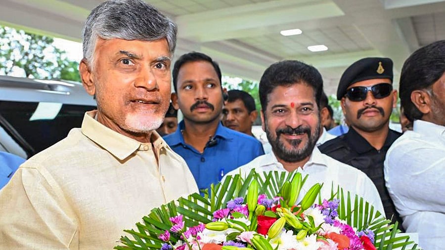 <div class="paragraphs"><p>Telangana Chief Minister Revanth Reddy welcomes Andhra Pradesh Chief Minister N Chandrababu Naidu upon his arrival at Praja Bhavan, in Hyderabad.</p></div>
