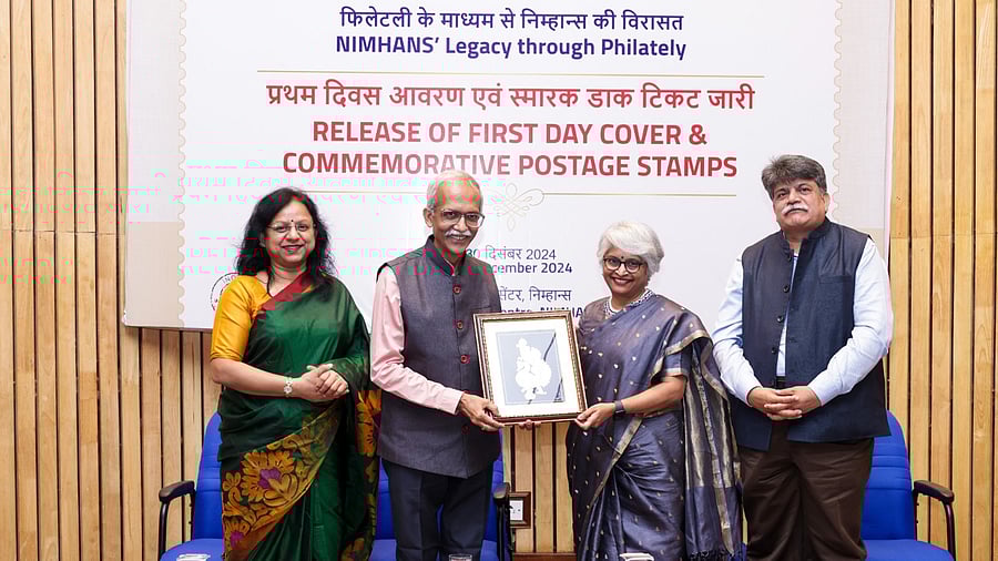 <div class="paragraphs"><p>Dr Pratima Murthy, Director of Nimhans, hands over a memento to S Rajendra Kumar, Chief Postmaster General of India Post’s Karnataka Circle, during the event on Monday. </p></div>