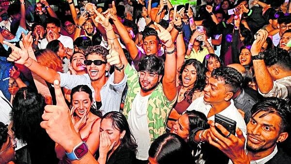 <div class="paragraphs"><p>People celebrate New Year at Brigade Road in Bengaluru</p></div>