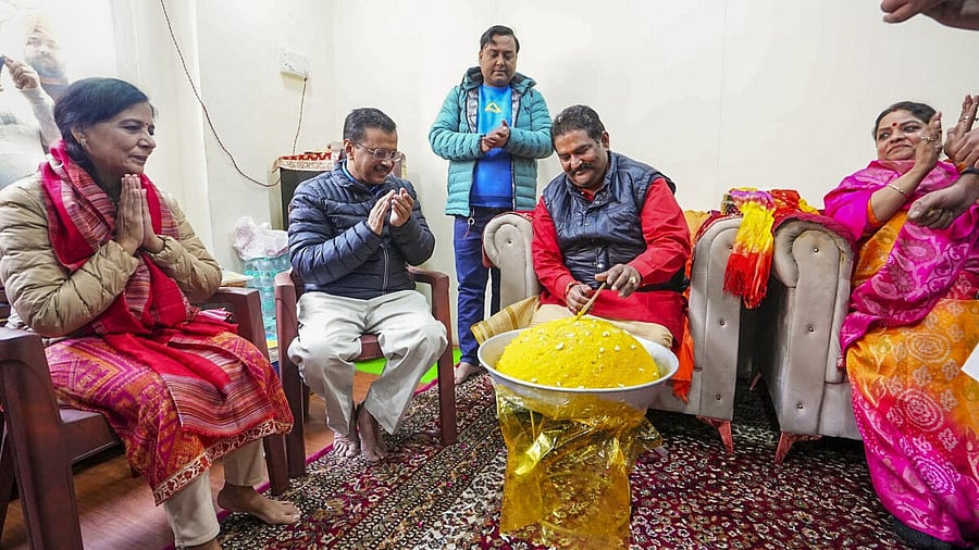 <div class="paragraphs"><p>AAP national convener Arvind Kejriwal with his wife Sunita Kejriwal during a visit to the Marghat Wale Baba temple to launch the 'Pujari Granthi Samman Yojana', in New Delhi.</p></div>