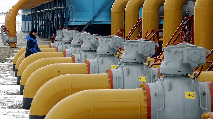 <div class="paragraphs"><p> A gas worker walks between pipes in a compressor and distribution station of the Urengoy-Pomary-Uzhgorod gas pipeline, some 30 km from the south western Russian city of Kursk. Representational purpose. </p></div>