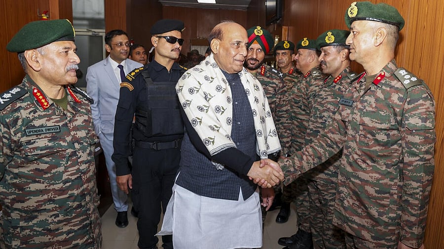 <div class="paragraphs"><p>Defence Minister Rajnath Singh with Chief of Army Staff (COAS) General Upendra Dwivedi and others.</p></div>