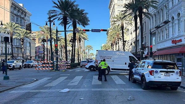 <div class="paragraphs"><p>Police attend the scene where a pickup truck drove into a large crowd on Bourbon Street</p></div>