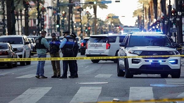 <div class="paragraphs"><p>Law enforcement officers gather near the site where people were killed by a man driving a truck during New Year's celebrations, Orleans, Louisiana, US January 1, 2025.</p></div>